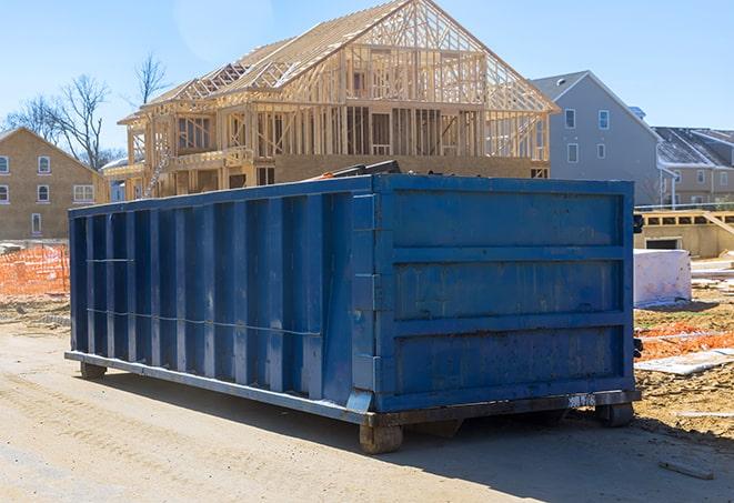 a neat and tidy residential dumpster area ready for trash pickup